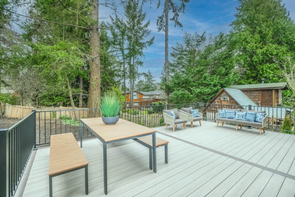 Modern residential backyard with a finished outdoor deck
